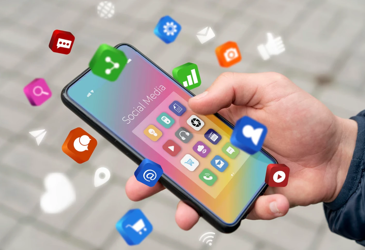 Smartphone entouré d'icônes de réseaux sociaux — community management multi-plateformes